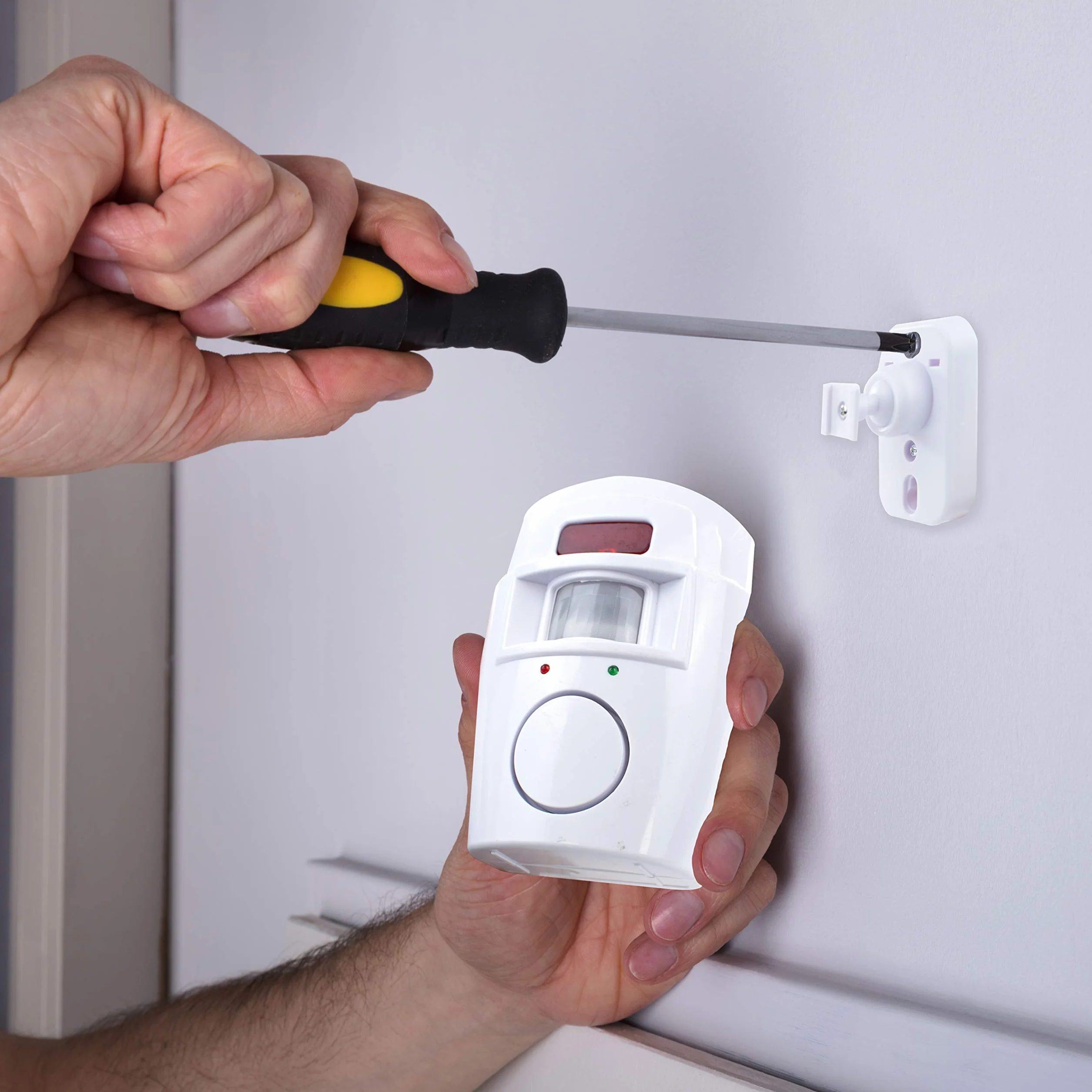 TRIXES Alarme de détection de Mouvement sans Fil pour abri de Jardin - Sécurité à Domicile - Alimenté par Batterie - pour garages d'été, caravanes - Système d'alarme - avec 2 x télécommande